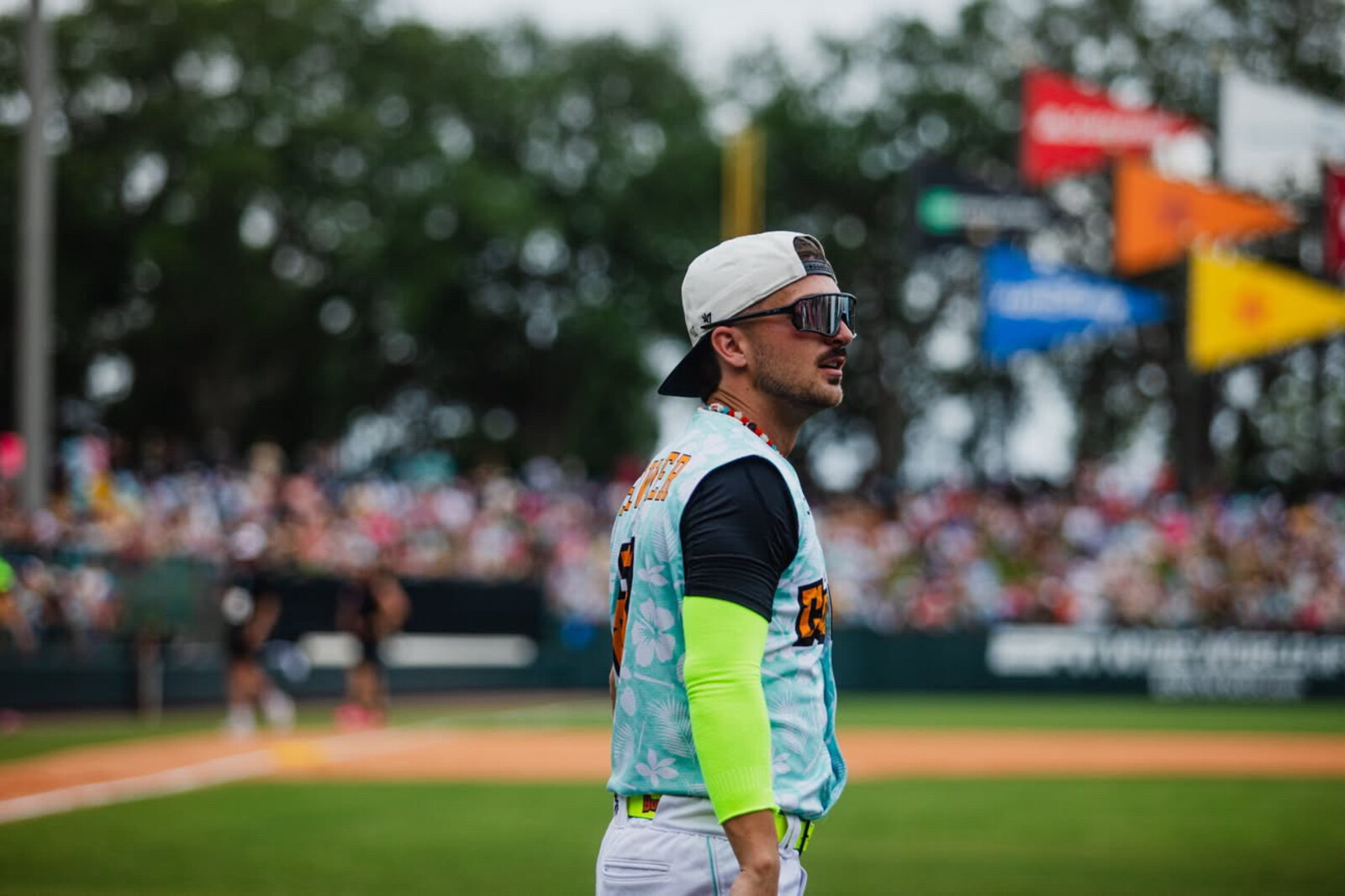 Profile portrait of a player in Squintz, stadium flags behind
